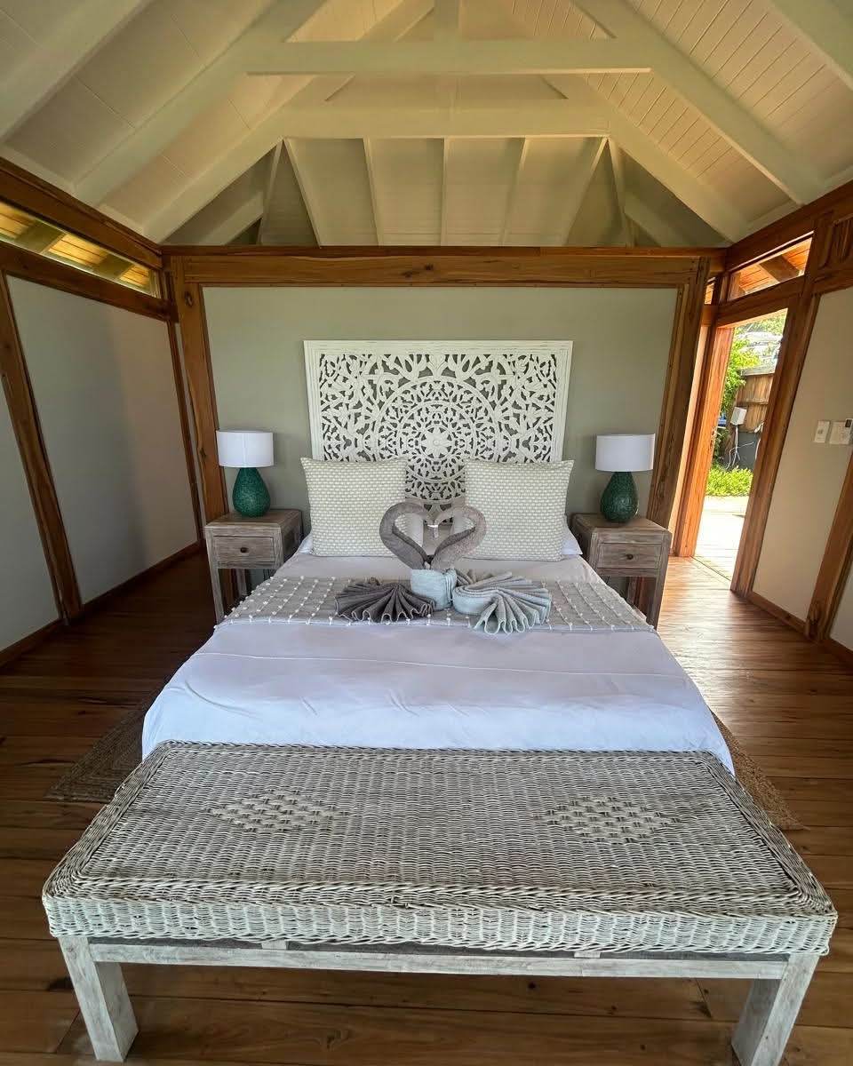 Villa bedroom with tropical accents
