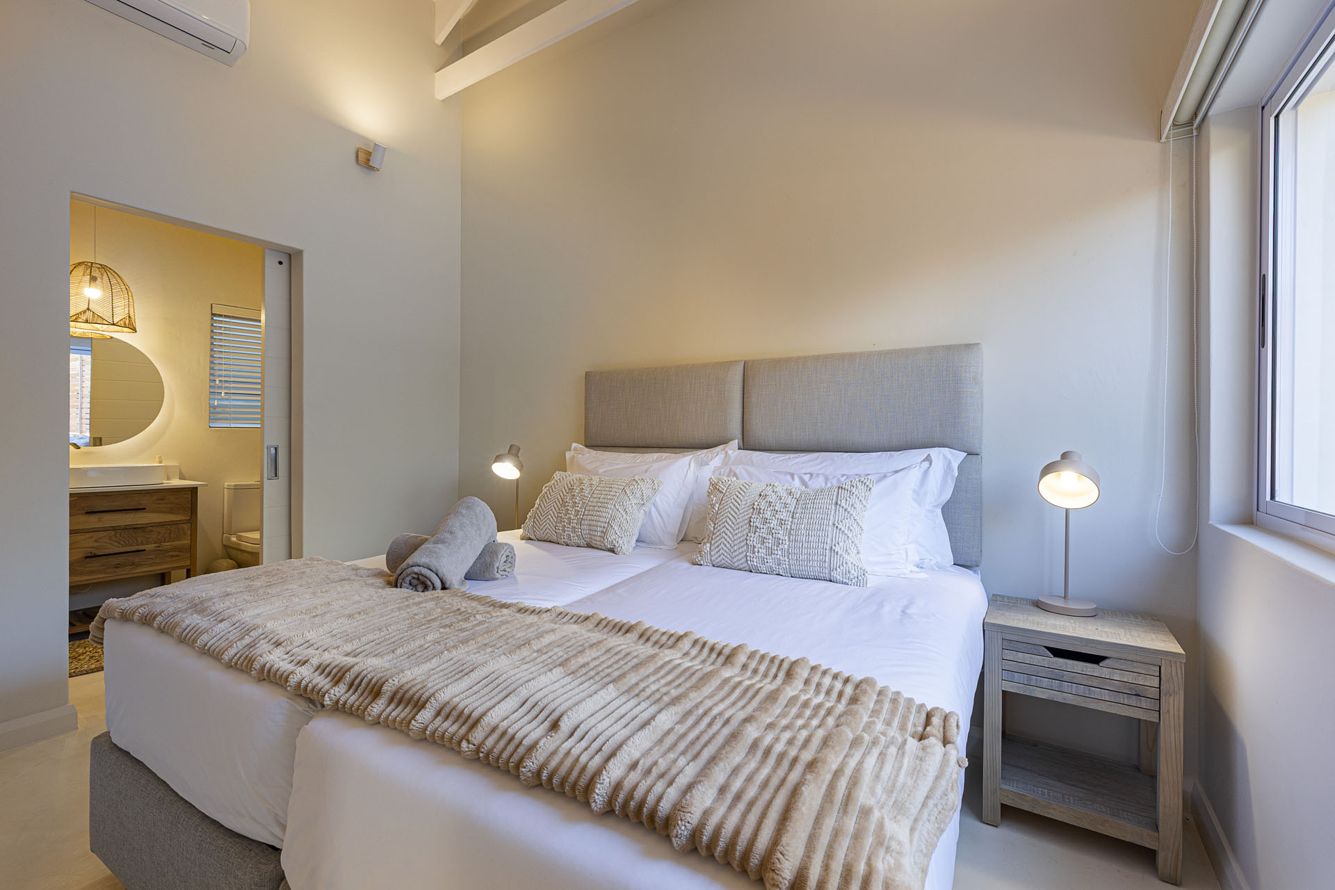 Guest bedroom with rattan accents